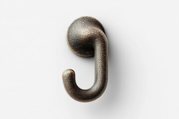 Obraz premium Decorative metal hook mounted on a white wall, showcasing a unique design and texture