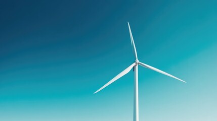 Fototapeta premium capture single towering wind turbine against vast blue sky emphasizing its sleek minimalistic design
