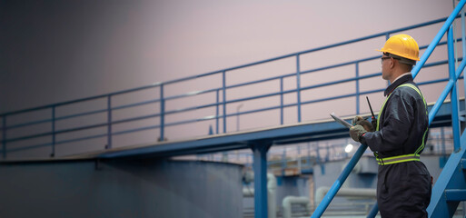 Petrochemical engineer working at petroleum oil refinery industry area. Industrial technician...