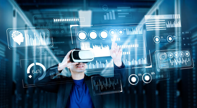 Businessman with headset standing at data center while analyzing financial data. Manager pointing marketing statistic hologram and using augmented reality goggles while making a decision. Ingenuity.