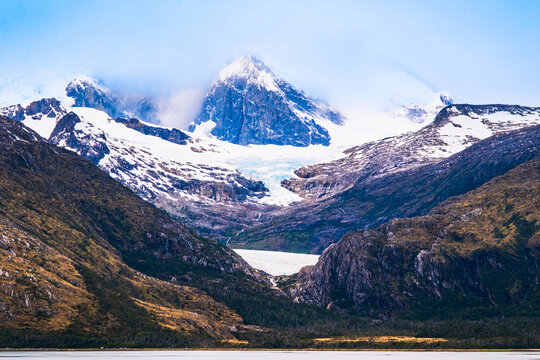 Oblicuo Glacier runs obliquely high up on the mountain and does not terminate in the Beagle Channel.  It  is located in Alberto de Agostini NP, Tierra del Fuego, Chile.