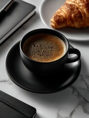 Fototapeta premium Rich coffee and croissant on a marble table