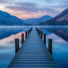 Naklejka premium Serene Pier Stretching Into Misty Waters at Dawn