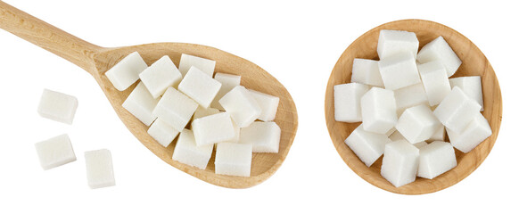Sugar cubes in a wooden spoon and bowl isolated on white background. Top view. Flat lay