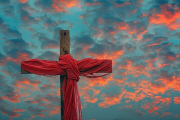 Wooden cross adorned with red ribbon against a bright blue sky filled with fluffy clouds, symbolizing faith and hope, copy space for text