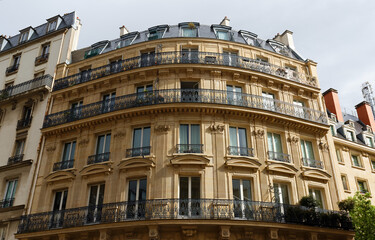 The typical facade of Parisian building, France.