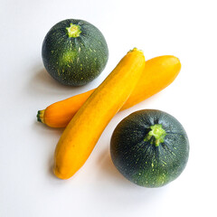 Round and Yellow Zucchini Squash on Isolated White Background