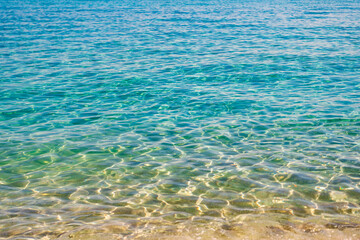 Aquamarine ocean nature. Background of clear turquoise sea water. Idyllic summer vacation....