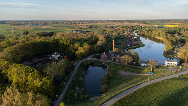 Appeltern, the Netherlands - April 19th 2025: Aerial photo of 'de Tuut', a historic steam pumping station, previously used for water management. 