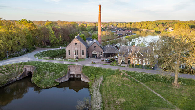Appeltern, the Netherlands - April 19th 2025: Aerial photo of 'de Tuut', a historic steam pumping station, previously used for water management. 