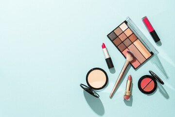 Beauty products on blue background.