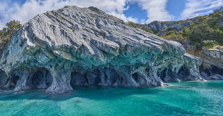 Marble Caves, the most beautiful natural sight in General Carrera Lake in Chile. Surreal rock formations. Curved walls covered in unique patterns. Boat tour to the caves. Tourist attraction.