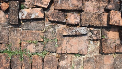 The brick floor of an old castle. The old brick floor has decayed over time. The floor of an ancient place.
