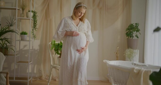 Pregnant Woman Preparing for Birth in Decorated Room