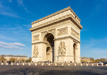 Fototapeta premium Triumphal arch (Arc de Triomphe) on Charles de Gaulle square in Paris, France