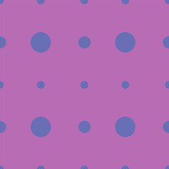 Blue polka dot print of different sizes on a bright background.Seamless vector pattern for any surfaces and the web.