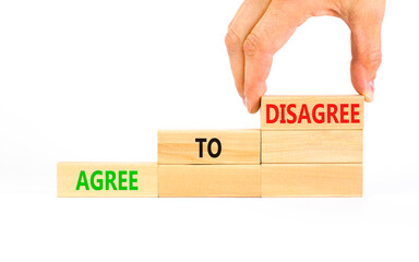 Agree to disagree symbol. Concept words Agree to disagree on beautiful wooden block. Businessman's...
