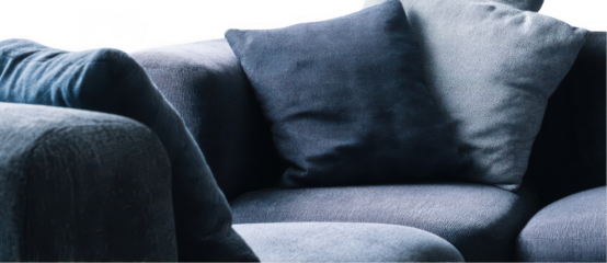 Modern sofa with armrests and a backless, navy blue fabric, isolated on a white background, png