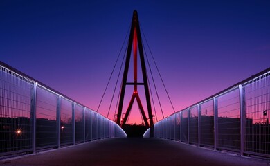 Symmetrical View of Modern Pedestrian Bridge at Twilight