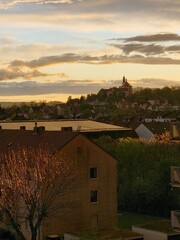View of Fulda with Frauenberg Monastery during the golden hour at sunset