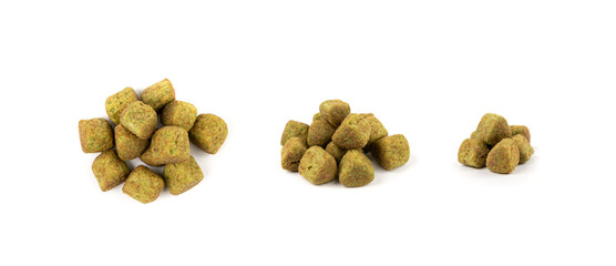 Dry pet food, dog color kibble pile, puppy meat and vegetable pellets, canine protein granules