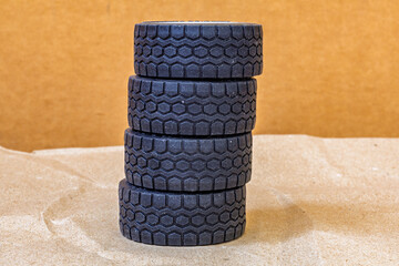 Pile of toy semi-truck tires, set of wheels, 4 tires stacked storage