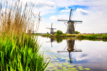 Canal and Old, Charming Windmills in Kinderdijk, Netherlands