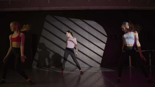 Young girls in dance class performing incredibly majestic dancing