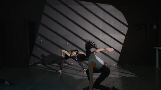 Young girls in dance class performing incredibly majestic dancing