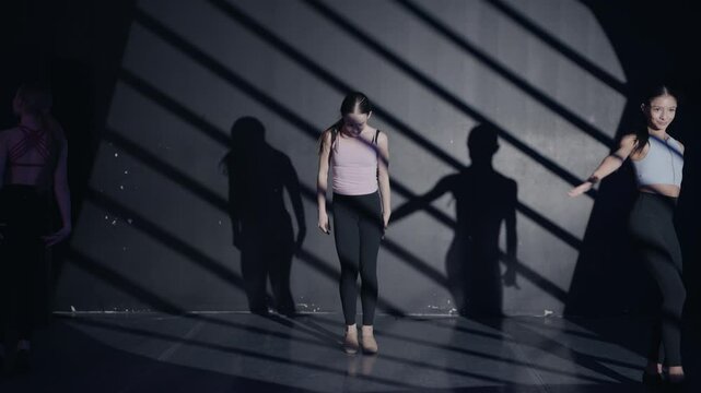 Young girls in dance class performing incredibly majestic dancing