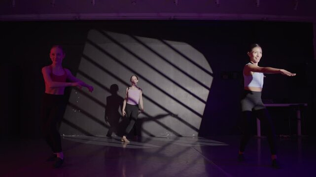 Young girls in dance class performing incredibly majestic dancing