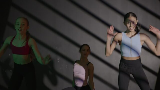 Young girls in dance class performing incredibly majestic dancing