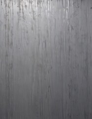 Obraz premium Close-up of a weathered grey metal sheet, reflective highlights , pattern, old metal, weathered