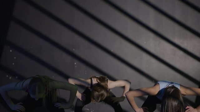 Young girls in dance class performing incredibly majestic dancing