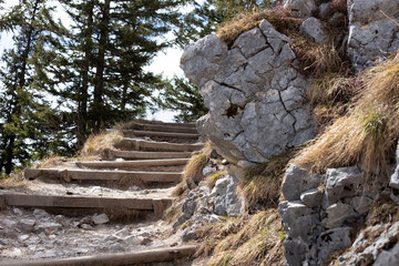 Stairs with a stone in the mountains