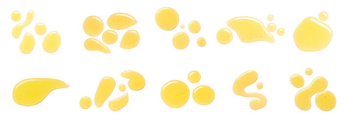Many drops of honey on white background