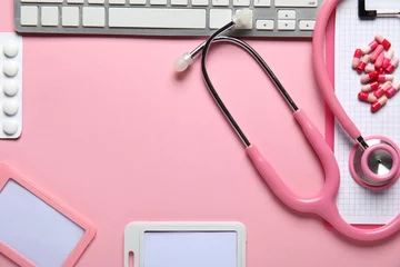 Gordijnen Frame made of stethoscope, pc keyboard, badges and pills on pink background © Pixel-Shot