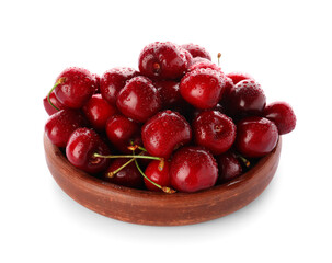 Plate with sweet cherries on white background