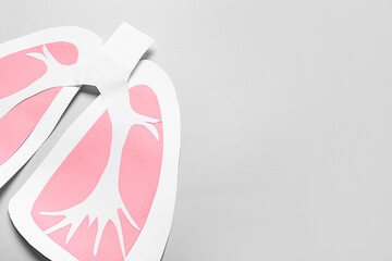 Paper lungs on grey background