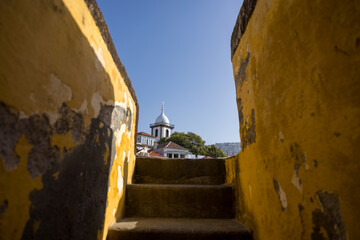 View of the tower of Church of Saint Mary the Great from the Fort of São Tiago in Funchal. Madeira Island, Portugal.