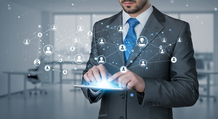 Businessman using tablet network connection digital technology modern office glowing interface