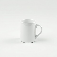 Obraz premium A clean, empty white ceramic mug with a curved handle, set against a light gray background.