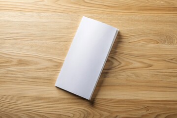 Fototapeta premium Blank Brochure Template Mockup on Wooden Table, Elegant Stationery Design
