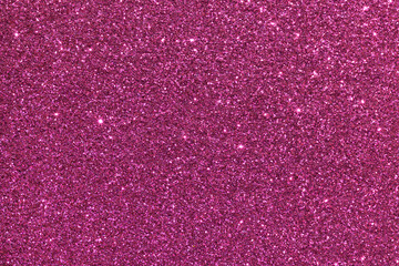 A pink background with glittery texture