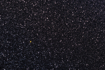 A black background with a yellow star in the middle