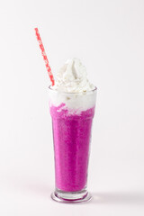 A glass of pink drink with a red straw in it. The drink is pink and has a lot of whipped cream on top
