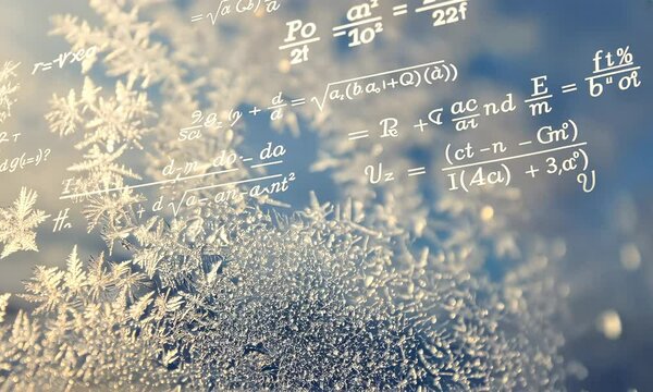 Mathematical equations over frosty window with sunlight