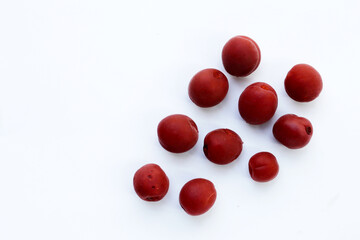 Umeboshi, Japanese pickled plums, Sour and salty taste.