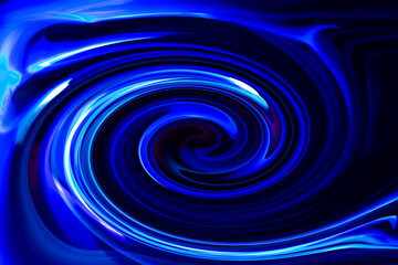 黒バックの中の青い光の渦のグラフィック