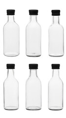 Isolated Transparent Bottles Arrangement With Black Caps on White Background